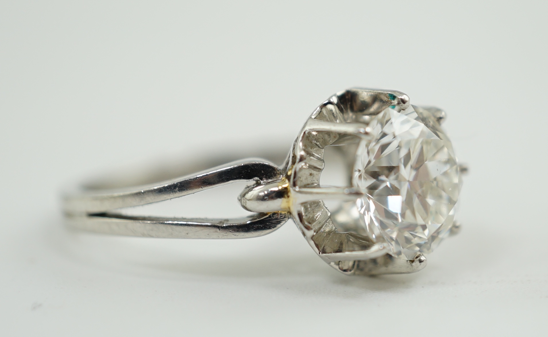 A platinum and solitaire diamond set ring